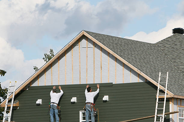 Professional Siding Installation technician working in Morton Grove, IL